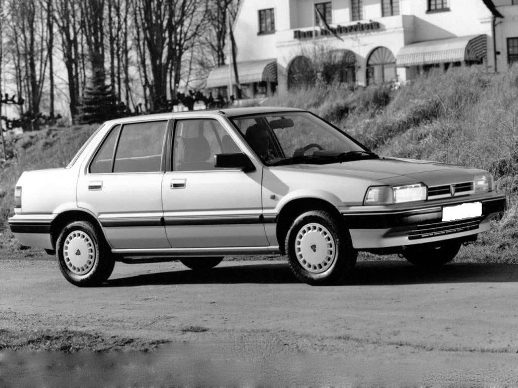 Rover série 200 1ère génération 4 portes grise.